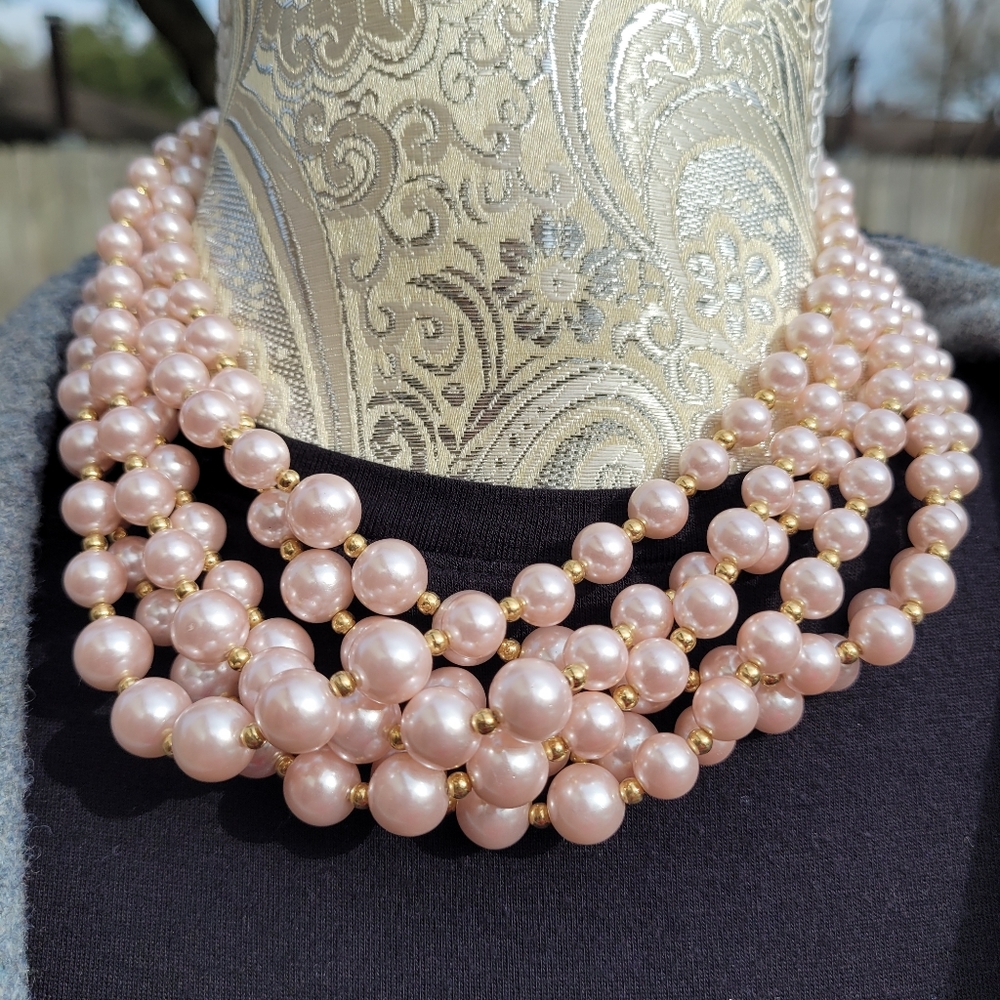 Elegant Multistrand Pink Pearl Necklace with Gold Accents